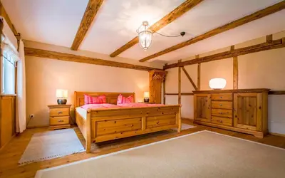 Ein Bett oder Betten in einem Zimmer der Unterkunft Ferienhaus Unter den Eschen