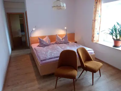 Ein Bett oder Betten in einem Zimmer der Unterkunft Ferienwohnung Kälberstall