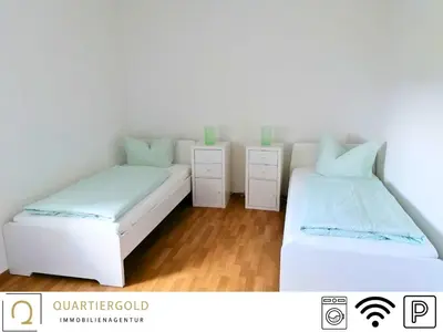 Ein Bett oder Betten in einem Zimmer der Unterkunft Monteurapartment I Lausitzring I BASF