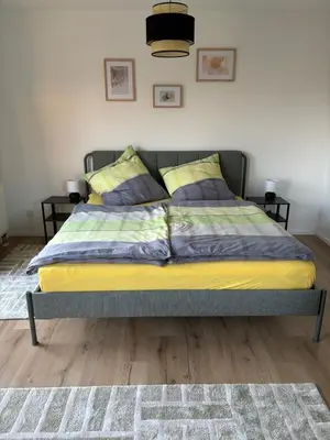 Ein Bett oder Betten in einem Zimmer der Unterkunft Ferienhaus Dresdener Ausblick