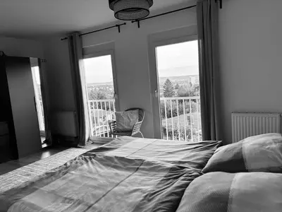 Ein Bett oder Betten in einem Zimmer der Unterkunft Ferienhaus Dresdener Ausblick