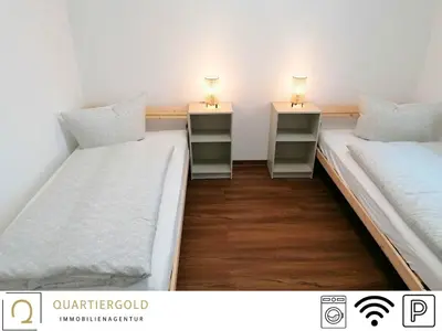 Ein Bett oder Betten in einem Zimmer der Unterkunft Monteurwohnung I WLAN I Parkplatz