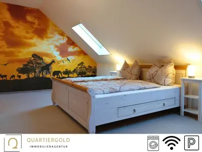 Ein Bett oder Betten in einem Zimmer der Unterkunft Monteurwohnung mit Stil