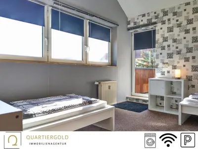 Ein Bett oder Betten in einem Zimmer der Unterkunft Monteurwohnung mit Stil