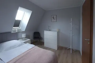 Ein Bett oder Betten in einem Zimmer der Unterkunft Ferienwohnung 