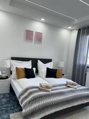 Ein Bett oder Betten in einem Zimmer der Unterkunft Saphierblue Appartment