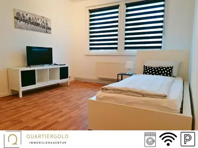 Ein Bett oder Betten in einem Zimmer der Unterkunft Apartment I Business I Monteure