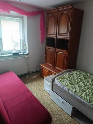 Ein Bett oder Betten in einem Zimmer der Unterkunft Silberranch Niederlichtenau