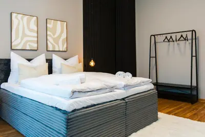 Ein Bett oder Betten in einem Zimmer der Unterkunft Maison & Mood Apartments Colditz I Design Studios