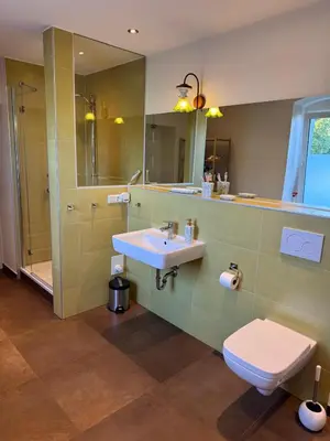 Ein Badezimmer in der Unterkunft Ferienhaus Niemtsch -Alte Schule-