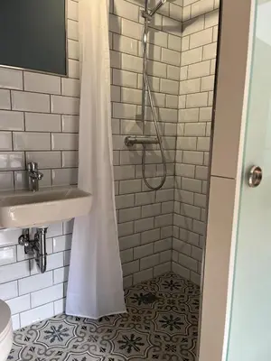 Ein Badezimmer in der Unterkunft Rosa,s Garten