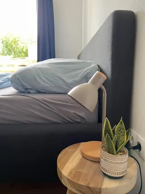 Ein Bett oder Betten in einem Zimmer der Unterkunft Rosa,s Garten