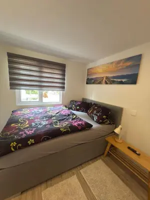 Ein Bett oder Betten in einem Zimmer der Unterkunft Am Zeißigwald
