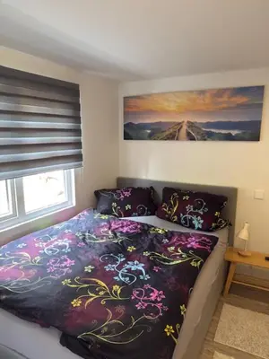 Ein Bett oder Betten in einem Zimmer der Unterkunft Am Zeißigwald