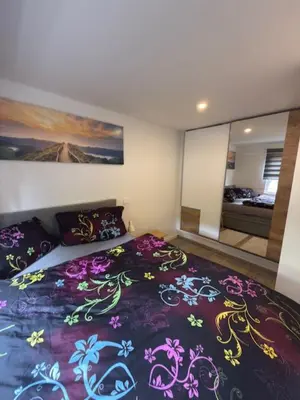 Ein Bett oder Betten in einem Zimmer der Unterkunft Am Zeißigwald