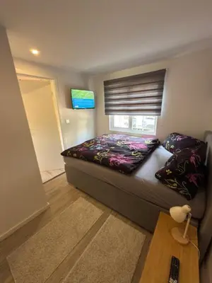 Ein Bett oder Betten in einem Zimmer der Unterkunft Am Zeißigwald