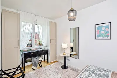 Ein Bett oder Betten in einem Zimmer der Unterkunft Art Deco Residence Elbblick Parken Küche