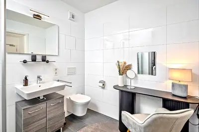 Ein Badezimmer in der Unterkunft Art Deco Residence Elbblick Parken Küche