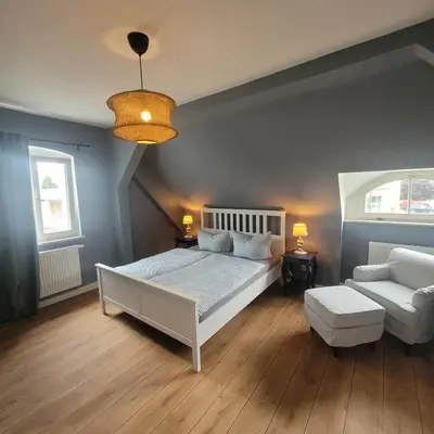 Ein Bett oder Betten in einem Zimmer der Unterkunft Kutscherhaus mit 2 Schlafzimmer im Zentrum von Senftenberg