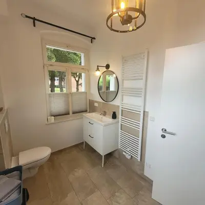 Ein Badezimmer in der Unterkunft Kutscherhaus mit 2 Schlafzimmer im Zentrum von Senftenberg