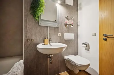 Ein Badezimmer in der Unterkunft Royal Garden Residence