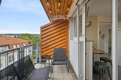 Ein Balkon oder eine Terrasse in der Unterkunft JuMar - 2-BR Apartment SunSet Nahe Elbe