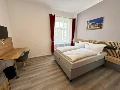 Ein Bett oder Betten in einem Zimmer der Unterkunft CityScape Hotel