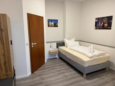 Ein Bett oder Betten in einem Zimmer der Unterkunft CityScape Hotel