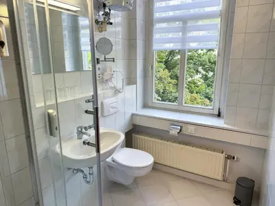 Ein Badezimmer in der Unterkunft CityScape Hotel