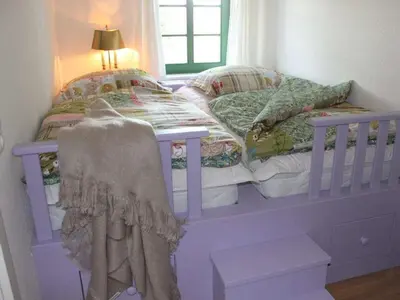 Ein Bett oder Betten in einem Zimmer der Unterkunft dreamlike Elb-Chalet