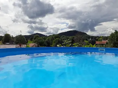 Der Swimmingpool an oder in der Nähe von Kügler Comfortable Holiday Residence
