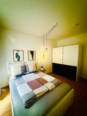 Ein Bett oder Betten in einem Zimmer der Unterkunft Appartment am Bahnhof Mitte