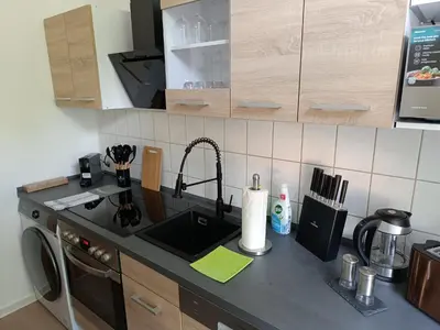 Küche/Küchenzeile in der Unterkunft Sonnen Resort mit Balkon, 2 Schlafzimmer und mehr