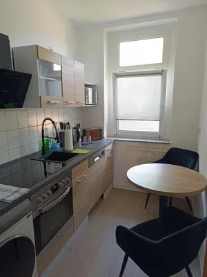Küche/Küchenzeile in der Unterkunft Sonnen Resort mit Balkon, 2 Schlafzimmer und mehr