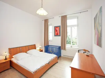 Ein Bett oder Betten in einem Zimmer der Unterkunft Elegant Villa in Borstendorf