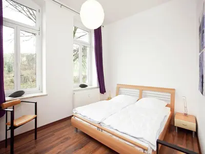 Ein Bett oder Betten in einem Zimmer der Unterkunft Elegant Villa in Borstendorf
