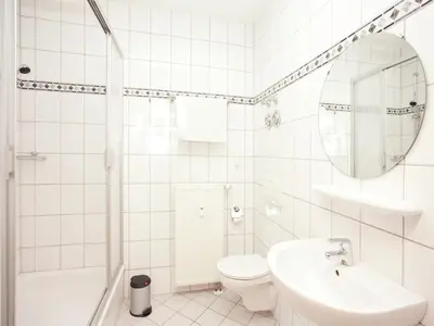 Ein Badezimmer in der Unterkunft Elegant Villa in Borstendorf