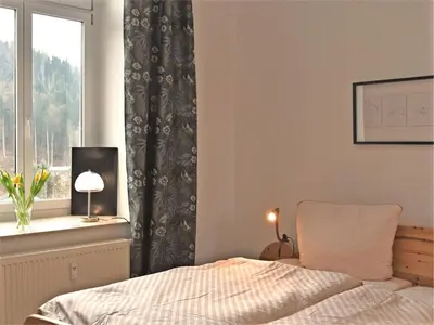 Ein Bett oder Betten in einem Zimmer der Unterkunft Villa in Borstendorf nahe Erzgebirge