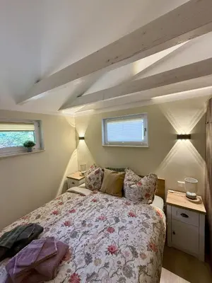 Ein Bett oder Betten in einem Zimmer der Unterkunft Ferienhaus am See