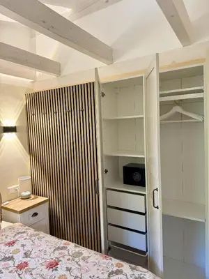 Ein Bett oder Betten in einem Zimmer der Unterkunft Ferienhaus am See