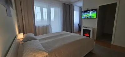 Ein Bett oder Betten in einem Zimmer der Unterkunft StadtZentrum Apartment - Frei Parkplatz - Xbox
