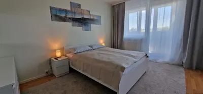 Ein Bett oder Betten in einem Zimmer der Unterkunft StadtZentrum Apartment - Frei Parkplatz - Xbox