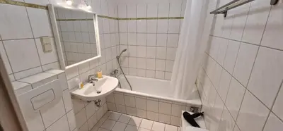 Ein Badezimmer in der Unterkunft StadtZentrum Apartment - Frei Parkplatz - Xbox