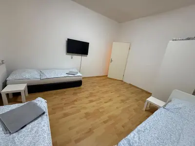 Ein Bett oder Betten in einem Zimmer der Unterkunft Monteurwohnungen in Wurzen östlich von Leipzig