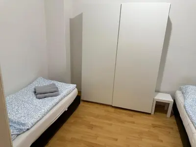 Ein Bett oder Betten in einem Zimmer der Unterkunft Monteurwohnungen in Wurzen östlich von Leipzig