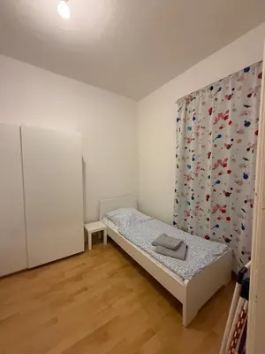 Ein Bett oder Betten in einem Zimmer der Unterkunft Monteurwohnungen in Wurzen östlich von Leipzig