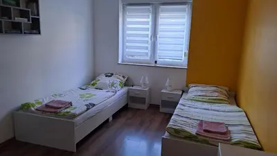 Ein Bett oder Betten in einem Zimmer der Unterkunft Bungalow Haus mit 3 Schlafzimmern nähe Dresden