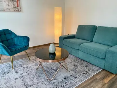 Ein Sitzbereich in der Unterkunft Moderne Ferienwohnung im Zentrum von Grimma