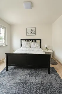 Ein Bett oder Betten in einem Zimmer der Unterkunft Zimmer nähe Dresden