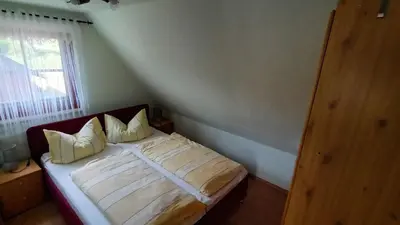 Ein Bett oder Betten in einem Zimmer der Unterkunft Ferienwohnungen Ihle